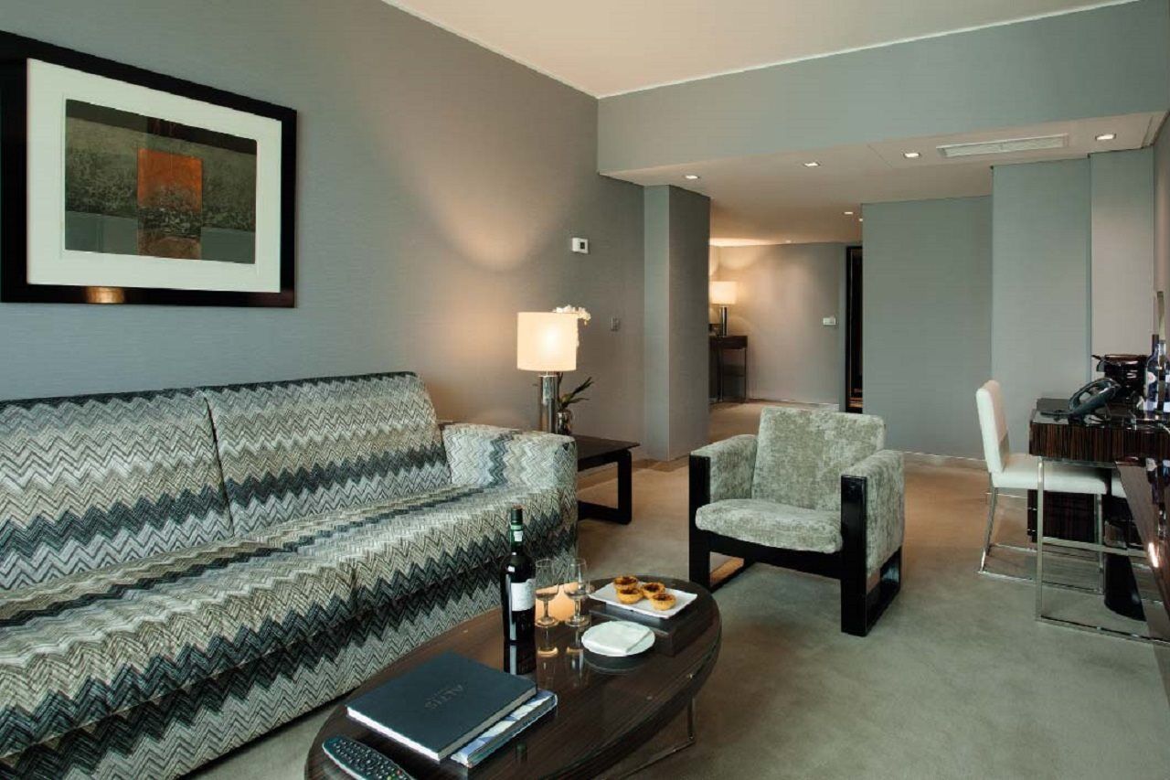 Altis Grand Hotel Lisbon Exterior photo A living room in a suite at the Mandarin Oriental, Hong Kong