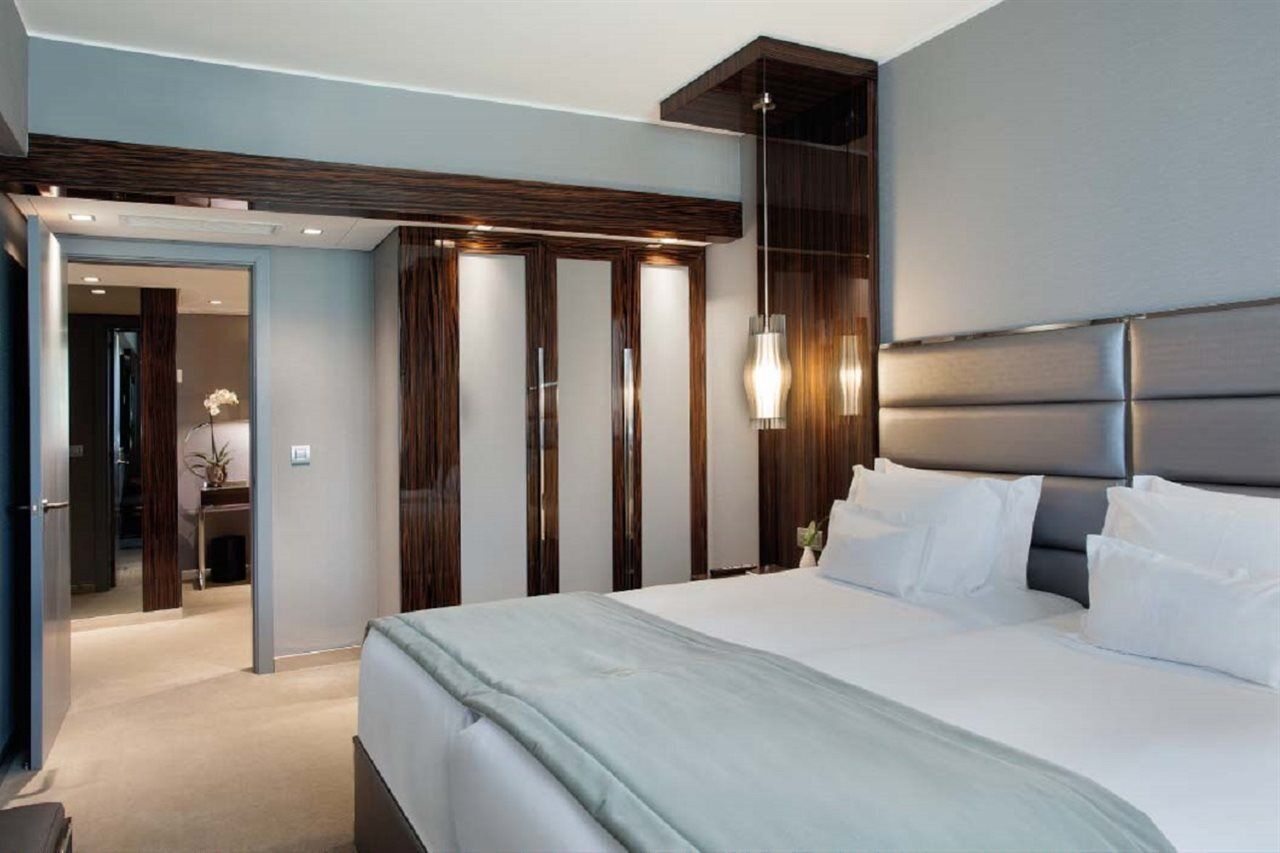 Altis Grand Hotel Lisbon Exterior photo A bedroom at the hotel